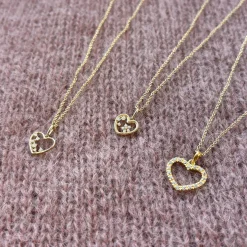 SCROUPLES HJERTE VEDHÆNG I 8 KARAT GULD MED 6 ZIRKONIA STENE - 215683