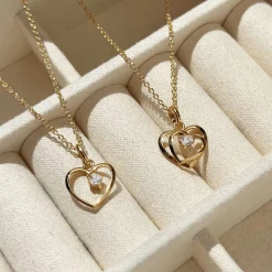 SCROUPLES HJERTE VEDHÆNG I 8 KARAT GULD MED ZIRKONIA - 214933