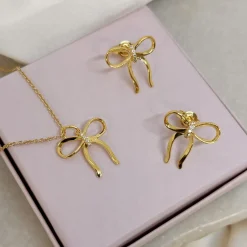 SCROUPLES SLØJFE ØRERINGE I FORGYLDT SØLV MED ZIRKONIA - 166122